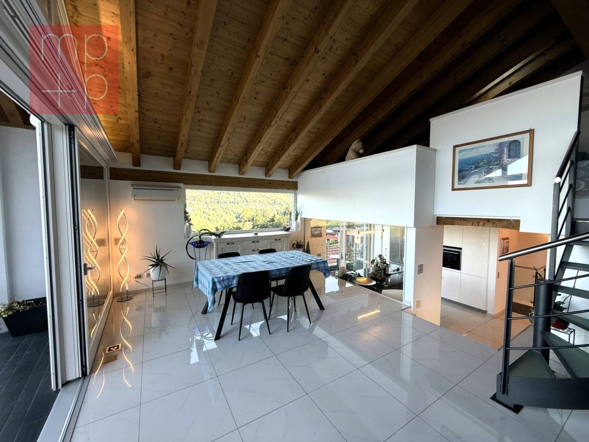 Attico duplex in vendita a Lugano con vista lago, terrazze panoramiche e finiture di alto standing - Asset
