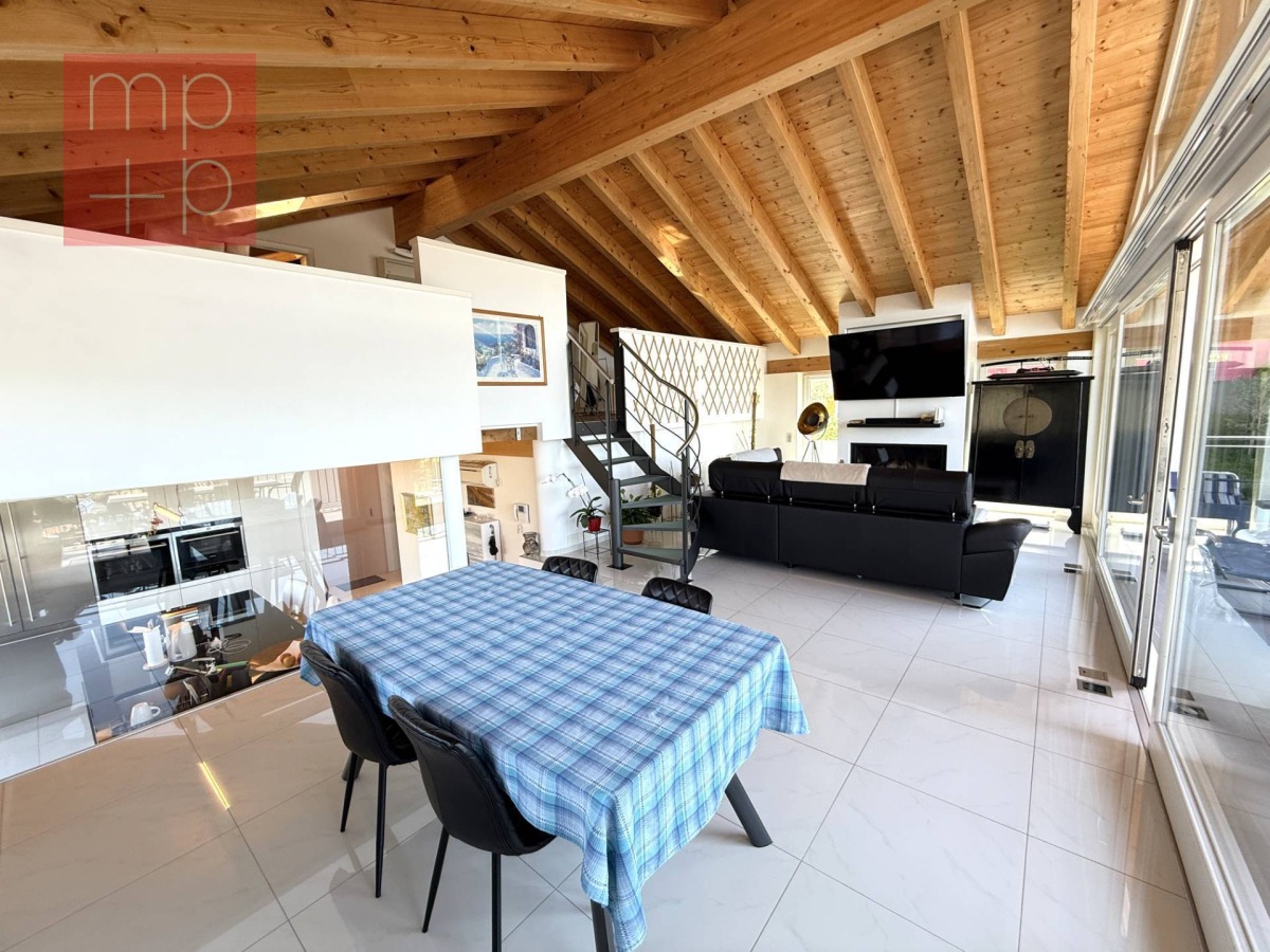 Attico duplex in vendita a Lugano con vista lago, terrazze panoramiche e finiture di alto standing - Asset